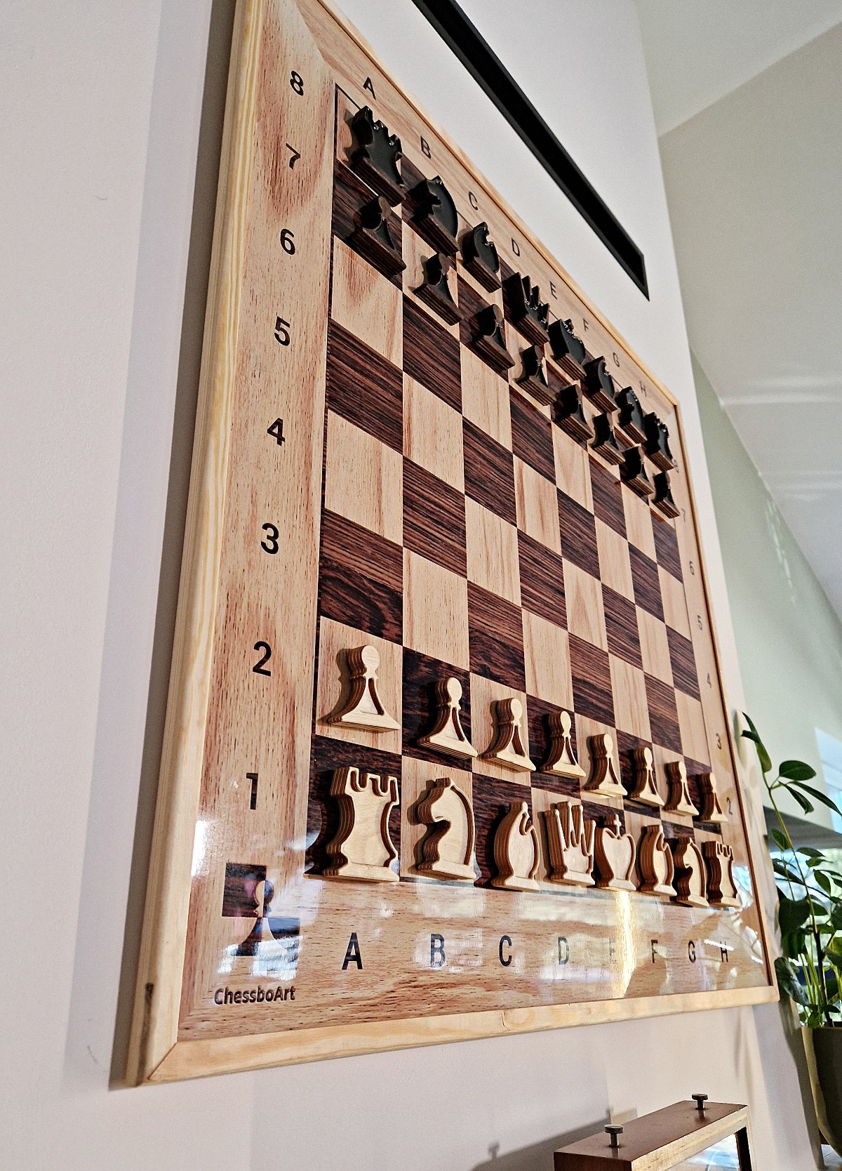 White chess figures made of light plywood.