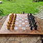 Handcrafted American walnut chessboard with resin and silver leaf. Size: 40x40 cm