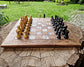 Handcrafted American walnut chessboard with resin and silver leaf. Size: 40x40 cm